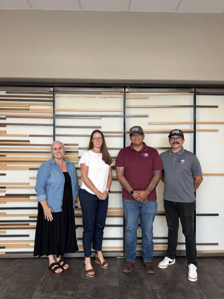 Guaranteed Painting Company team presenting $5,000 donation check to Voices for Children, CASA